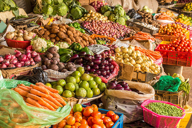 Colorful fruits and vegetables colorfully arranged at a local fruit and vegetable market in Nairobi, Kenya.